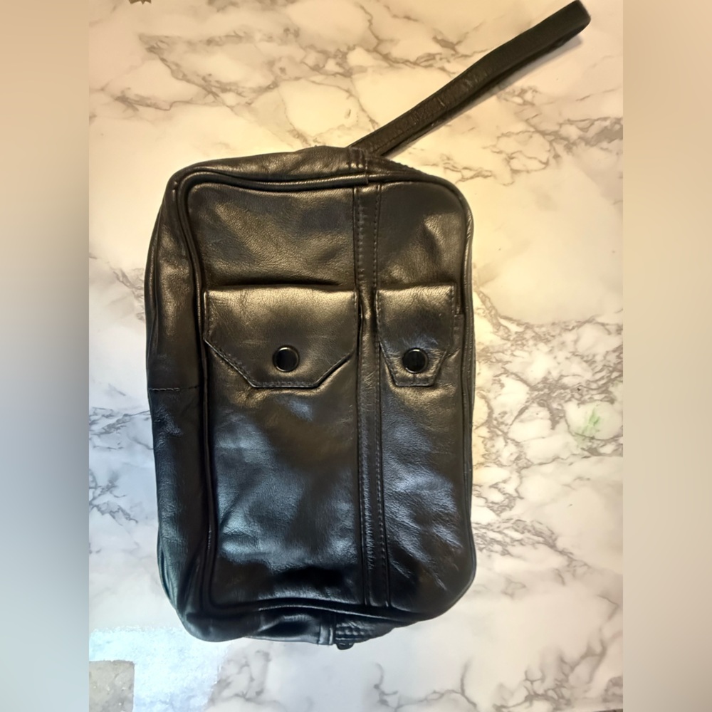 Black leather zippered clutch with pockets